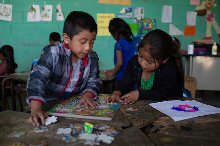 Children in kindergarten study during class. Santa Barbara, Huehuetenango, Guatemala. February 11, 2020.