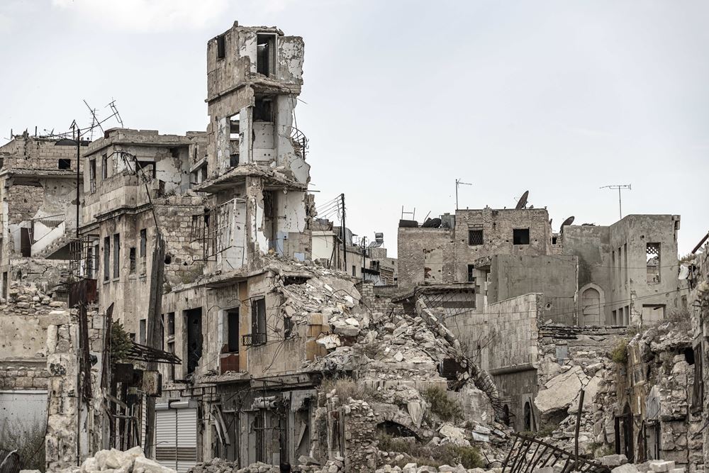 Zerstörte Häuser in Aleppo (Quelle: AdobeStock)