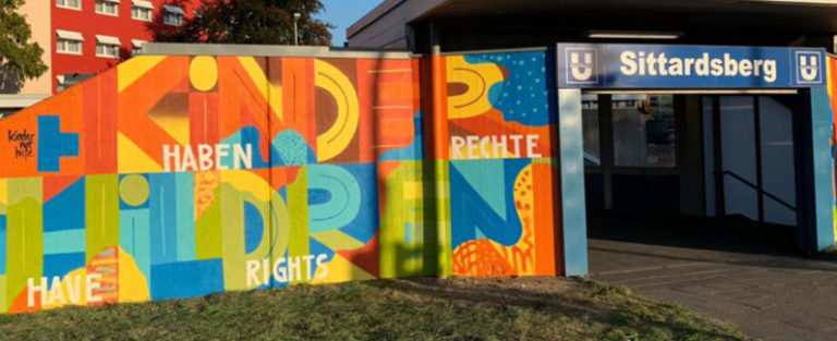 Kindernothilfe Graffiti an der Bahnstation Sittardsberg (Quelle: Kindernothilfe)