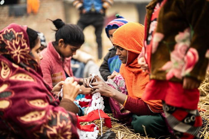 Ein Bild einer Selbsthilfegruppe aus Nepal (Foto : Jakob Studnar / Kindernothilfe) Ein Bild einer Selbsthilfegruppe aus Nepal (Foto : Jakob Studnar / Kindernothilfe)