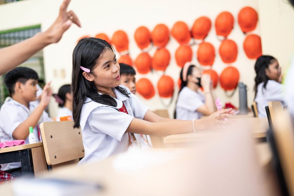 Ein Mädchen in der Schule in Manila (Quelle: Jakob Studnar) Ein Mädchen in der Schule in Manila (Quelle: Jakob Studnar)